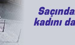 Saçından tuttuğu kadını dakikalarca sürükledi