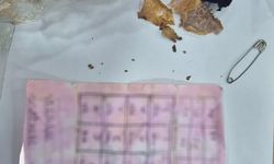 Bolu’da yapı marketin raflarının arasında muska çıktı: "Büyücülerin şerrinden Allah’a sığınırım"